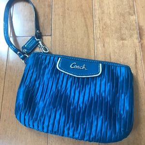 Turquoise blue Coach wristlet